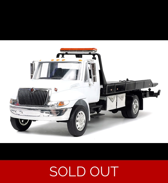 International Durastar 4400 Flatbed Tow Truck